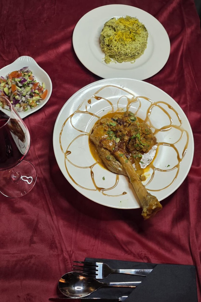 Ziba Restaurant’s tender, slow-cooked lamb shank served on a bed of dill and fava bean rice in 
Dunfermline.