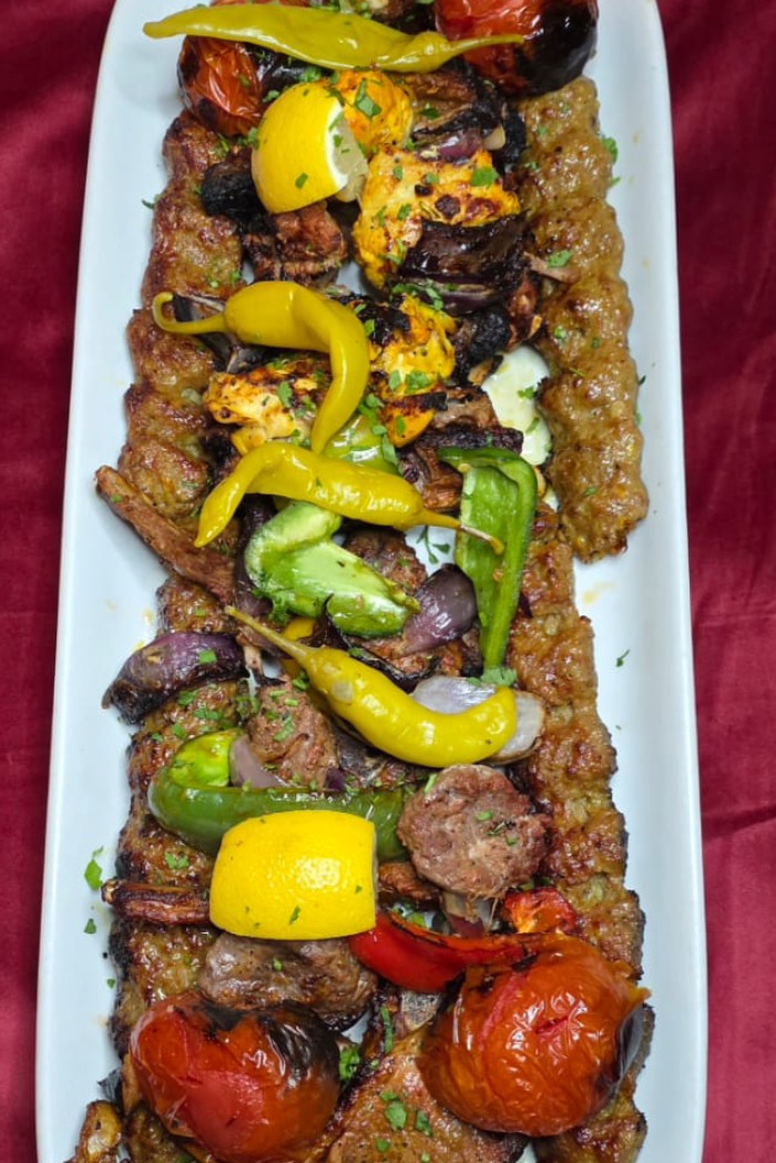 Ziba Restaurant’s Mixed kebab platter with saffron rice, side salad, sauce, and flatbread in 
Dunfermline